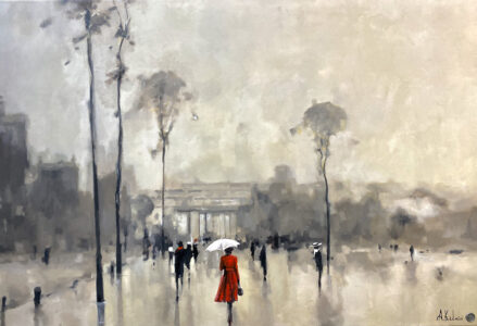 woman in red coat walking in the rain